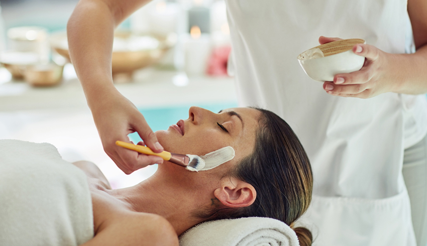 A woman getting a chemical peel treatment